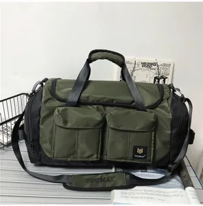 Details of large capacity military green travel duffel bag with multi pockets and shoulder strap.