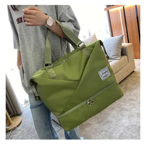 Large capacity travel duffel bag for women, waterproof fitness gym bag with wet dry compartment.