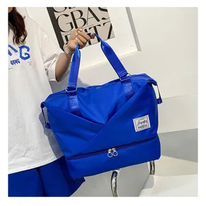 Blue travel duffel bag large capacity fitness gym bag waterproof weekend overnight bag.