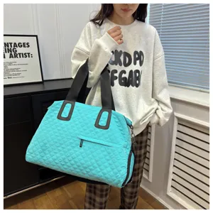 Teal quilted travel tote bag, large capacity shoulder crossbody bag for fitness and leisure.