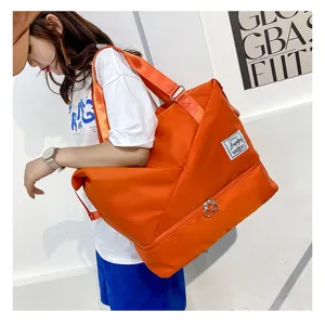 Large capacity travel duffel bag for women, waterproof lightweight fitness bag with dry wet separation.