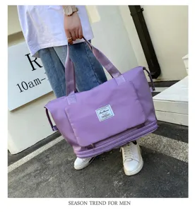 Grand sac de voyage imperméable pour femme sac à main pliable pour courts trajets.