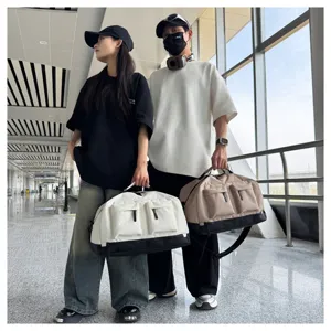 Large capacity travel duffel bag with multiple pockets and wet dry compartment for gym commute