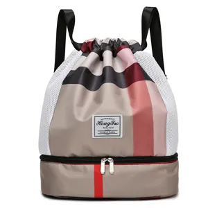 Sac à dos cordon multifonctionnel à motif écossais classique et compartiment étanche.