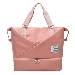 Pink travel duffel bag with separate shoe compartment, large capacity gym bag for women.