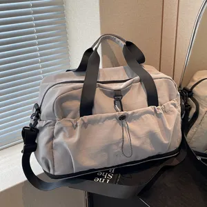 Large capacity travel duffel bag for women, lightweight waterproof fitness gym sports bag