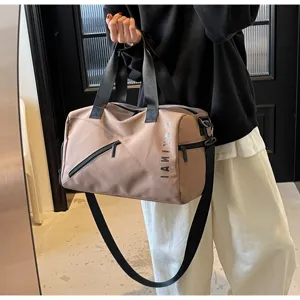 Large capacity travel duffel bag for women and men, waterproof gym sports bag with wet dry compartment.