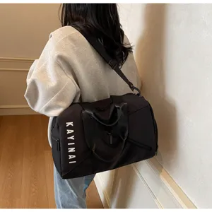 Large capacity waterproof travel duffel bag for gym, sports, and short business trips.