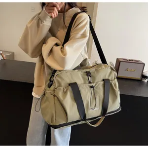 Large capacity travel bag for women, lightweight waterproof sports fitness luggage handbag detail.