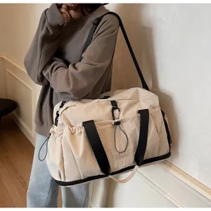 Large capacity travel duffel bag lightweight waterproof sports gym bag for women daily use.