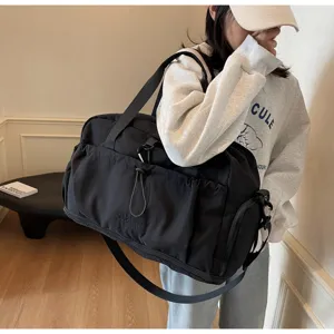 Large capacity travel duffel bag for women lightweight gym bag waterproof overnight luggage bag