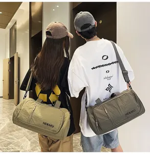 Large capacity travel duffel bag for women, waterproof gym sports bag with shoulder strap.