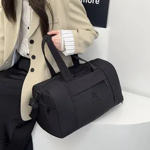 Sac de voyage noir portable pour le sport et le fitness, grand sac de voyage décontracté.
