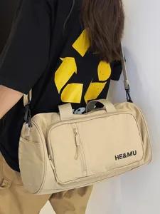 Large capacity travel duffel bag lightweight sports fitness handbag for women daily use.