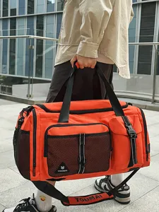 Large capacity orange travel duffel bag for men and women gym sports weekend overnight trips