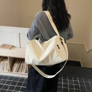 Large capacity canvas travel duffle bag, casual shoulder bag for sports, fitness and daily use.