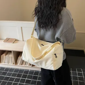 Large capacity canvas gym duffel bag for women, perfect for travel weekend shoulder bag use.