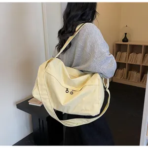 Grand sac de voyage en toile grande capacité, sac bandoulière de sport décontracté.