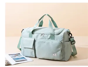 Light green travel duffel bag detail, large capacity gym bag with multi pockets and shoulder strap.