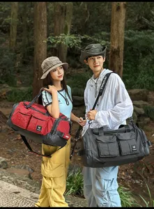 Outdoor multi-functional travel duffel bag detail, large capacity gym bag with wet dry compartment.