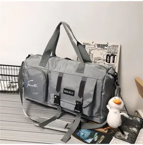 Gray multi-functional travel duffel bag, large capacity sports fitness bag detail view.