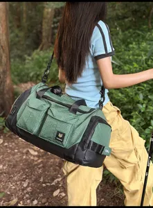 Multifunctional green grid travel duffel bag with large capacity, ideal for gym and outdoor.