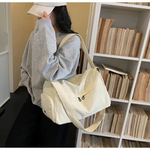 Grand sac de voyage en toile pour femme fitness sport bandouliere avec sangle large chic