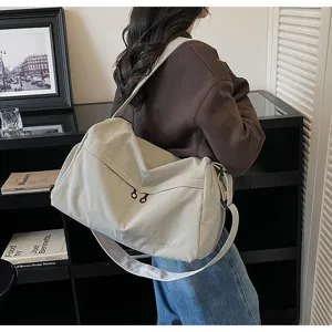 Grand sac de sport pour femme, sac de voyage étanche de grande capacité pour le fitness.