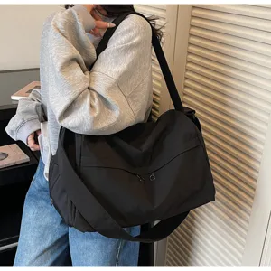 Grand sac bandouliere noir de grande capacite sac de voyage de commute decontracte