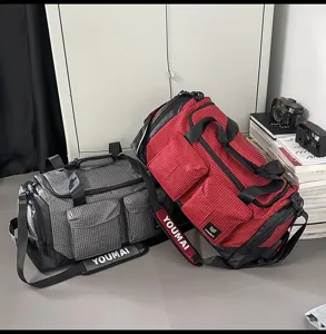 Detailed view of large capacity outdoor fitness duffel bag with dry wet separation feature.