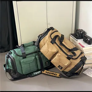 Large capacity outdoor travel duffel bag multi-pocket gym sports bag with durable checkered fabric.