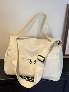 Grand sac de voyage en toile pour femme, sport, fitness et utilisation quotidienne.