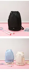 Large capacity sports drawstring backpack with separate shoe compartment and side pockets.