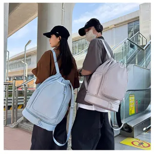 Detailed view of large capacity drawstring sports backpack, gym fitness bag scene display.