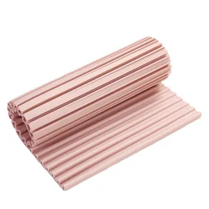 Pink rolling washboard and draining mat, anti-slip silicone washing board for home laundry.