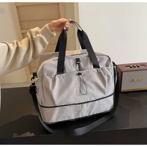 Detailed view of large capacity waterproof travel duffel bag, lightweight short trip handbag.