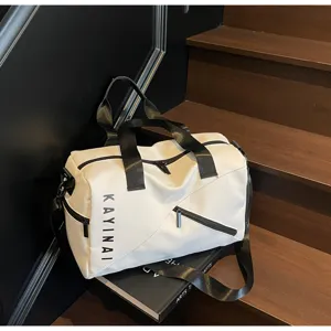 White travel duffel bag with black straps, large capacity fitness and sports gym bag for travel.