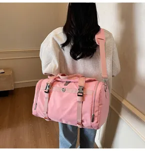 Large capacity pink travel duffel bag lightweight gym bag with shoulder strap for daily fitness.