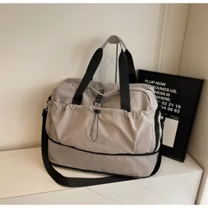 Large capacity travel bag, waterproof gym duffel bag with shoulder strap, grey travel luggage.