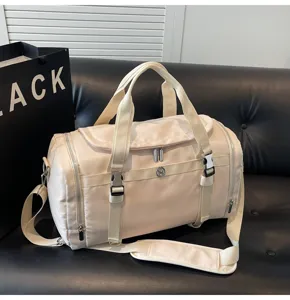 Large capacity travel duffel bag for women, lightweight gym bag with wet dry separation and straps.