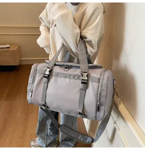 Large capacity travel gym bag for women, lightweight nylon duffel bag with dry wet separation.