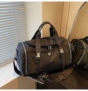 Large capacity black travel duffel bag, lightweight gym sports bag with adjustable shoulder strap.