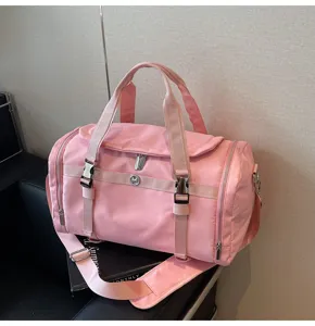 Pink travel duffel bag with large capacity, lightweight and waterproof gym bag for daily sports.