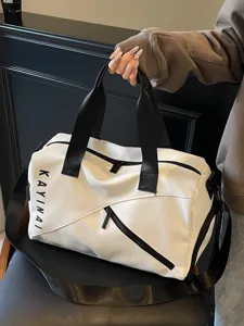 Large capacity waterproof travel duffel bag for women and men gym sports fitness use.