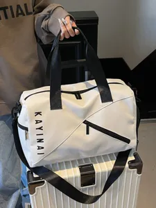 Large capacity waterproof travel duffel bag for women, lightweight gym fitness sports bag.