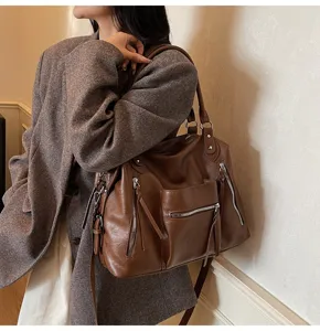 Bruine lederen shopper tas voor dames, grote schoudertas met handige ritsen voor dagelijks.