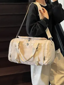 Large capacity travel duffel bag for women, lightweight waterproof gym bag with shoulder strap.