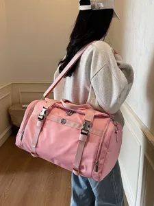 Pink large capacity travel duffel bag with wet dry compartment for women fitness sports