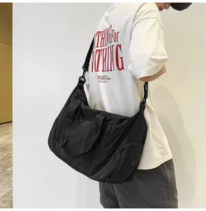 Detailed view of large waterproof travel duffel shoulder bag for sports and outdoor fitness.