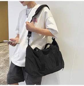Large capacity black shoulder duffel bag waterproof fitness travel bag for students.